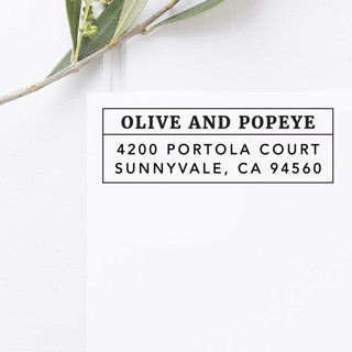 This is a black address labels by Port of Reverie called modern return address stamp, rectangle self inking in standard