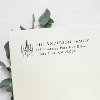 This is a black address labels by Samantha Malvey called chandelier address stamp | self inking return address stamp in standard