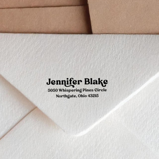 This is a black address labels by Sara Luke called retro style self-inking address stamp in standard