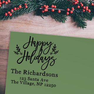 This is a black address labels by Casey Harp called custom happy holidays address stamp | self-inking | black ink in standard