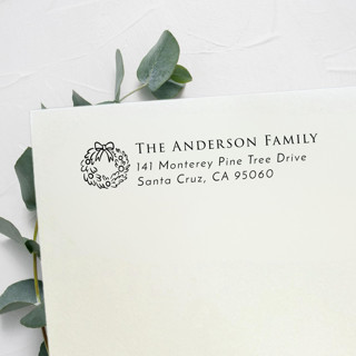This is a black address labels by Samantha Malvey called wreath address stamp, left aligned | self inking return address stamp in standard