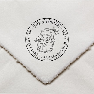 This is a black address labels by Sara Luke called christmas address stamp with vintage santa - self-inking in standard