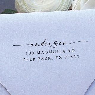 This is a black address labels by Samantha Malvey called classic family address stamp | self inking return address stamp in standard
