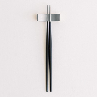 This is a black wedding decor by borrowed BLU called luna chopsticks // set in black + silver in standard