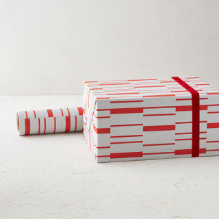 This is a crimson wrapping paper by Kelsey Walker called abstract candy cane in standard