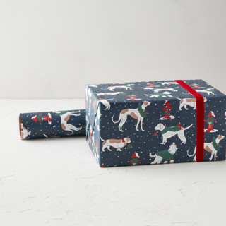This is a midnight wrapping paper by Kristin Mastoras called snowy dogs strolling in standard