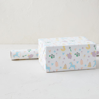 This is a pastels wrapping paper by Chelsea Petaja called baby's trinkets in standard
