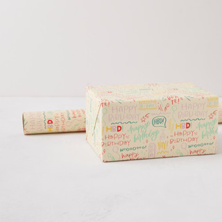 This is a celebrate wrapping paper by Olivia Goree called birthday doodles in standard