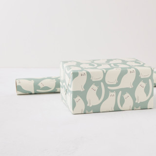 This is a teal wrapping paper by The Minty Elephant called white cats parade in standard
