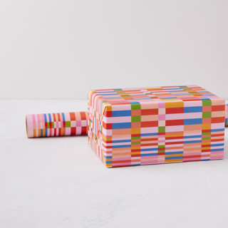 This is a sunrise wrapping paper by Dominique Vari called colourful kilim in standard