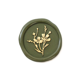 This is a gold wax seals by misterrobinson called cosmos wax seal stamp in standard