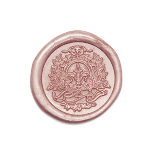 This is a gold wax seals by misterrobinson called fleur wax seal stamp in standard