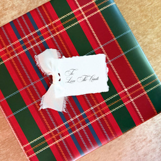 This is a white gift tags by Cotton and Bow called holiday handmade paper gift tags with snow white bow | set of 10 | custom text in standard