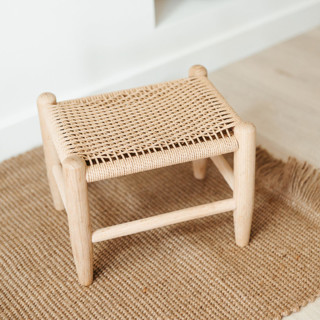 This is a beige accent furniture by Millstream Home called the danish cord footstool in standard